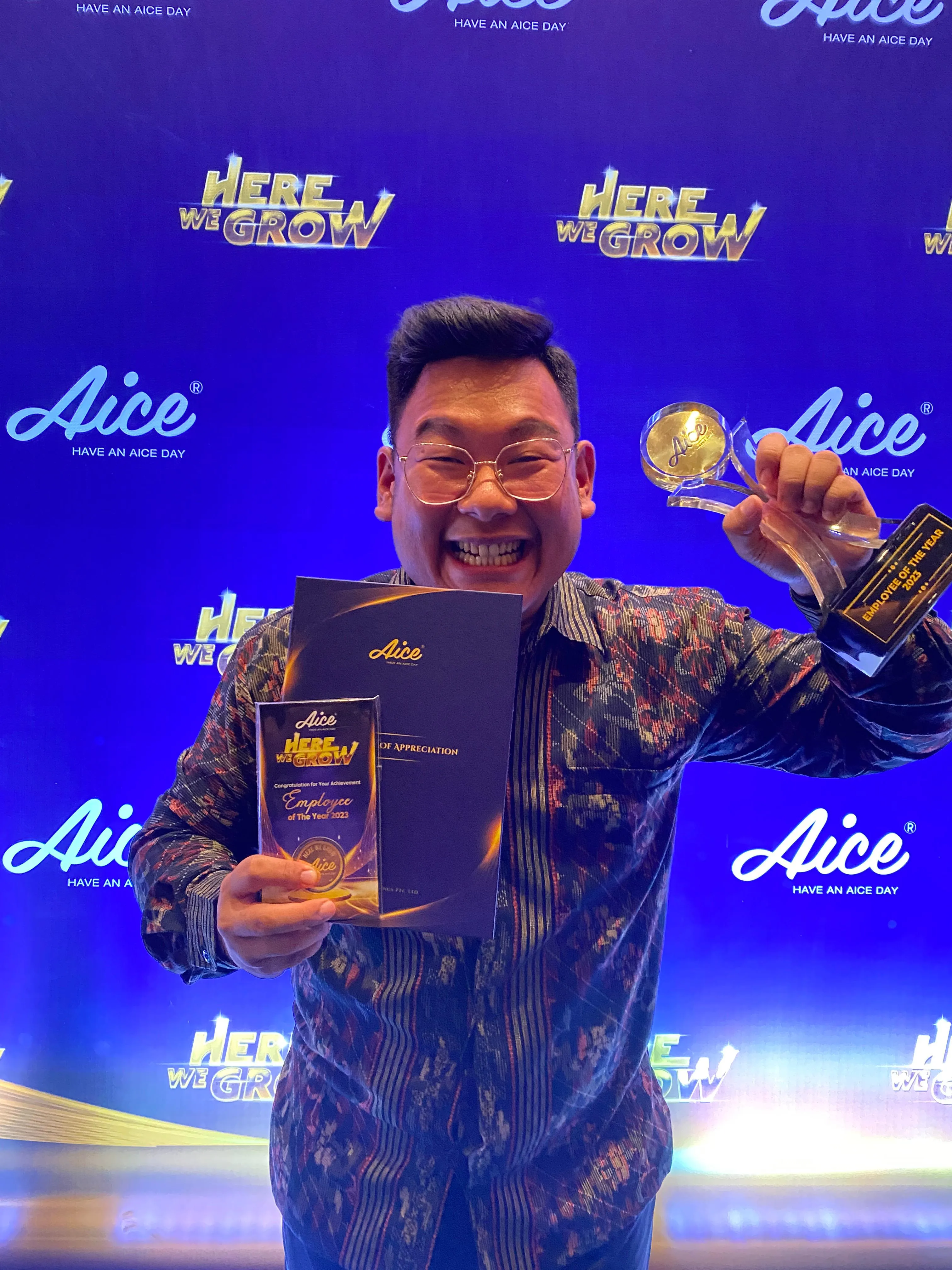 Aldy receiving Best Employee recognition